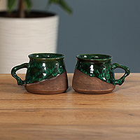 Ceramic coffee cups, 'Energizing Green' (pair) - Handcrafted Glazed Green and Brown Ceramic Coffee Cup Pair