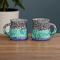 Ceramic mugs, 'Hues of Bliss' (pair) - 2 Handcrafted Painted Glazed Black Blue Green Ceramic Mugs