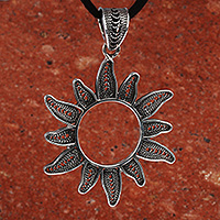 Sterling silver pendant necklace, 'New Sunshine' - Oxidized Sun-Shaped Sterling Silver Long Pendant Necklace