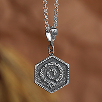 Sterling silver pendant necklace, 'Hexagonal Elegance' - Geometric Folk Art-Themed Sterling Silver Pendant Necklace