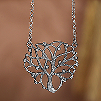 Sterling silver pendant necklace, 'Silhouette of Vitality' - Artisan-Made Sterling Silver Tree of Life Pendant Necklace