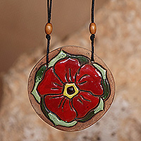 Ceramic pendant necklace, 'Petals in Fire' - Folk Art Orange Bloom Ceramic Pendant Necklace from Armenia