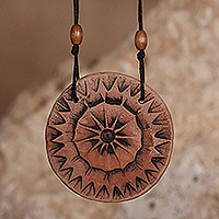 Ceramic pendant necklace, 'Ancient Sun' - Black and Brown Sun-Themed Ceramic Cord Pendant Necklace