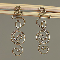 Brass drop earrings, 'Melody Spiral' - Modern Abstract Treble Clef Themed Brass Drop Earrings