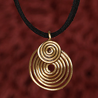 Brass pendant necklace, 'Sublime Spirals' - Folk Art Spiral-Themed Pendant Necklace with Antiqued Finish