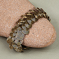 Brass link bracelet, 'Spiral Embrace' - Antique Finished Brass Link Bracelet with Spiral Design