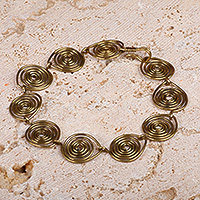 Brass link bracelet, 'Spiral Splendor' - Antiqued Brass Spiral Link Bracelet Handcrafted in Armenia