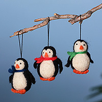 Wool felt ornaments, 'Penguin Colors' (set of 3) - Penguin-Shaped 3-Piece Wool Felt Ornament Set from Armenia