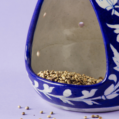 Ceramic bird feeder, 'Avian Retreat' - Blue Ceramic Floral Bird Feeder from India