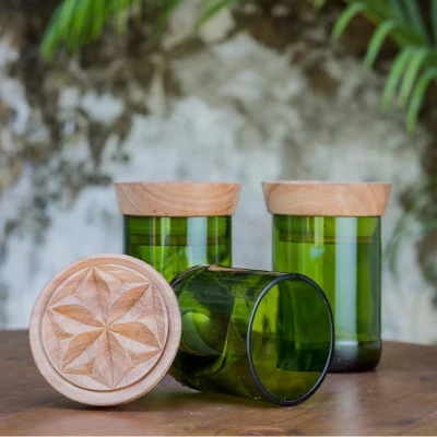 Upcycled glass jars, 'Cardamom Container' (large, pair) - Handcrafted Pair of Upcycled Green Glass Jars with Lids