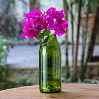 Upcycled glass vase, 'Kilua Flower' - Upcycled Green Glass Vase Handcrafted in Zanzibar