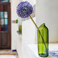 Upcycled glass vase, 'Kikuba' - Upcycled Green Glass Vase Handcrafted in Zanzibar