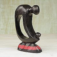 Featured review for Wood sculpture, Mother and Child