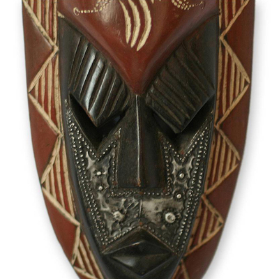 Nigerianische Holzmaske - Kunsthandwerklich gefertigte nigerianische Holzmaske aus Afrika