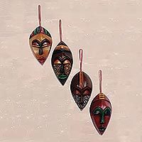 Holzornamente, „Celebration Masks“ (4er-Set) - Afrikanische Holz-Weihnachtsornamente (4er-Set)