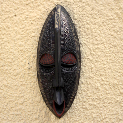 African wood mask, Family First