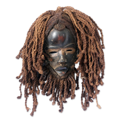 Afrikanische Holz- und Jute-Maske, 'Geist der Finsternis'. - Liberianische Holzmaske