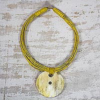 Horn and leather necklace, 'Talatu Gilga' - African Horn and Leather Pendant Necklace