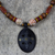 Agate and ebony pendant necklace, 'Mossi Womanhood' - Handcrafted African Wood and Agate Necklace