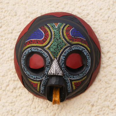 African beaded wood mask, Asomdwoe II