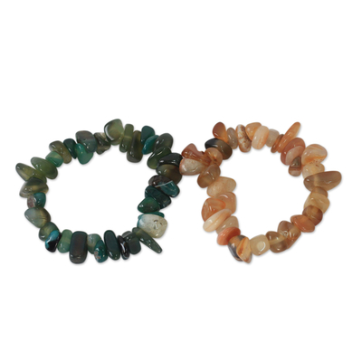 Beaded stretch bracelets, 'Green Orange Odo Tintine' (pair) - Beaded stretch bracelets (Pair)