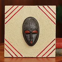 African mask plaque, Born on Wednesday