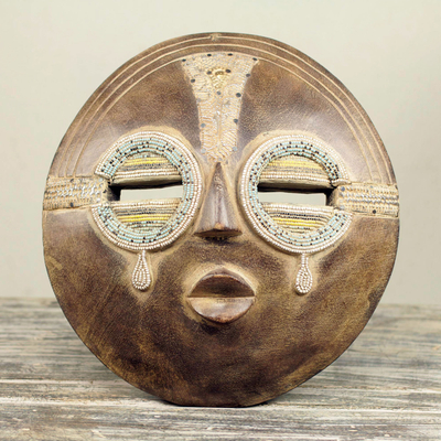African wall mask, Tears of Joy