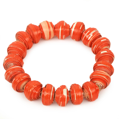 Recycled paper stretch bracelet, 'Taifa Tangerine' - Orange Handmade Bracelet with Recycled Paper Beads