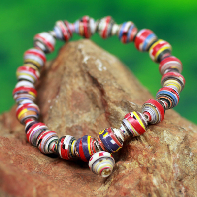 Recycled paper stretch bracelet, 'Love Affair' - Handmade Bracelet with Multicolor Recycled Paper Beads