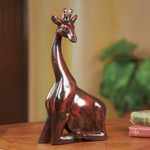 Wood sculpture, 'Kneeling Giraffe' - African Hand Carved Wood Kneeling Giraffe Sculpture