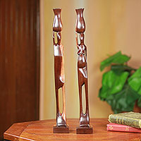 African ebony wood sculptures, Couple with Pots (pair)