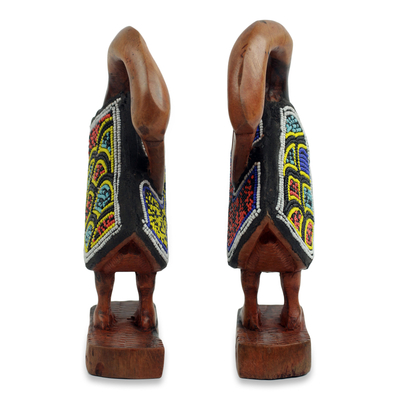 Beaded ebony wood sculptures, 'Sankofa Birds' (pair) - Hand Carved and Beaded Symbolic Bird Sculptures (Pair)