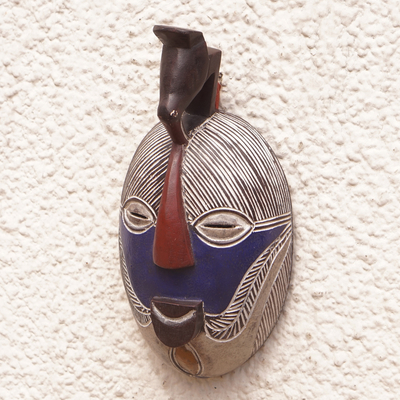 Congolese wood mask, 'Songye Kifwebe' - Handmade Congolese Wood Wall Mask with Bird Accent