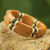 Wood stretch bracelet, 'Butterscotch Connection' - Recycled Plastic Wood Eco Friendly Bracelet from Africa thumbail