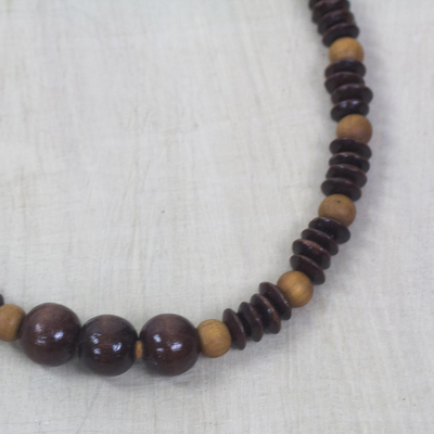 Wood beaded necklace, 'Dzidudu in Dark Brown' - Wood Beaded Dangle Necklace Artisan Crafted Jewelry