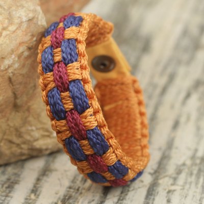 Men's wristband bracelet, 'Eternal Fire' - Hand Woven Orange, Wine and Blue Cord Bracelet for Men