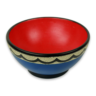 Wood centerpiece, 'Asanka Blue' - Hand Carved Red and Blue Wood Centerpiece