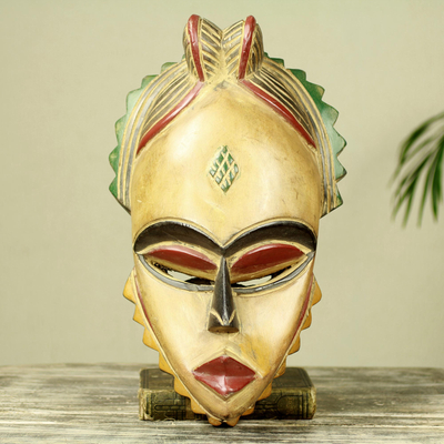 Afrikanische Holzmaske - Kunsthandwerklich gefertigte afrikanische Maske aus Holz geschnitzt