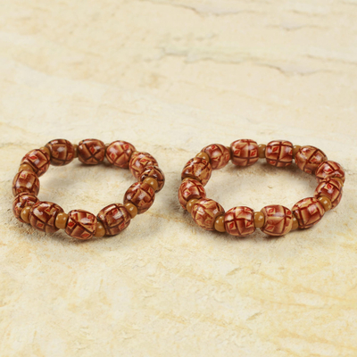 Wood stretch bracelets, 'Have Faith' (pair) - Ghana Hand Crafted Wood Stretch Bracelets (Pair)