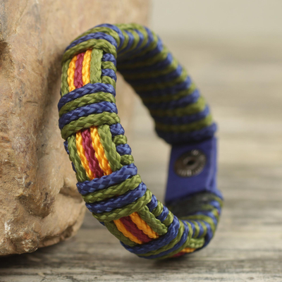Men's wristband bracelet, 'Proud Kente' - Men's Hand Crafted Cord Wristband Bracelet