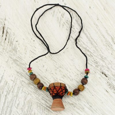 Beaded wood pendant necklace, 'Kpanlogo' - Unique African Kpanlogo Drum Pendant Necklace