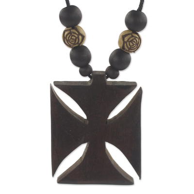 Wood pendant necklace, 'Adinkra Cross' - Ebony Bamboo and Sese Wood Floral Adinkra Pendant Necklace