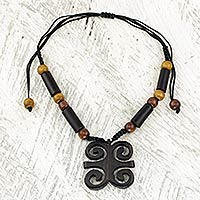 Ebony wood pendant necklace, 'Ram's Horns'