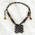 Ebony wood pendant necklace, 'Ram's Horns' - African Ebony and Sese Wood Ram's Horn Adinkra Necklace (image 2) thumbail