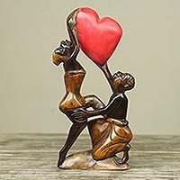 Featured review for Wood sculpture, The Love Struggle