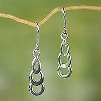 Sterling silver dangle earrings, 'Curvaceous Cascade' - Ghana Handcrafted Sterling Silver Earrings