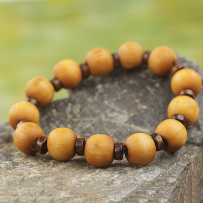 Wood stretch bracelet, 'Labadi Warmth' - Handcrafted Stretch Bracelet with Wood Beads