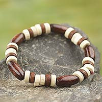 Wood stretch bracelet, 'Chocolate' - Artisan Crafted Wood Beaded Stretch Bracelet from Ghana