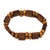 Wood stretch bracelet, 'Brown Radiance' - Artisan Crafted Sese Wood Stretch Bracelet from Ghana