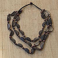 Coconut shell beaded necklace, 'Coconut Strands' - Handmade Coconut Shell and Sese Wood Beaded Necklace